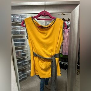 From Florence Italy. Brand new with tags so Tunic top so elegant.